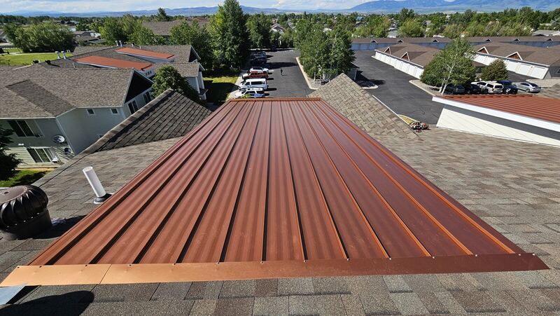 Standing-seam metal roof with mountain views — Montana