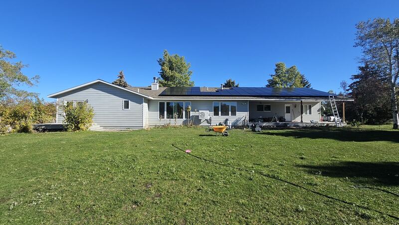 New standing-seam metal roof on a valley ranch home