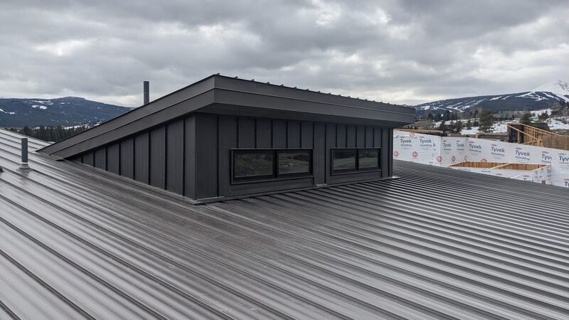 Charcoal standing-seam metal roof — Montana